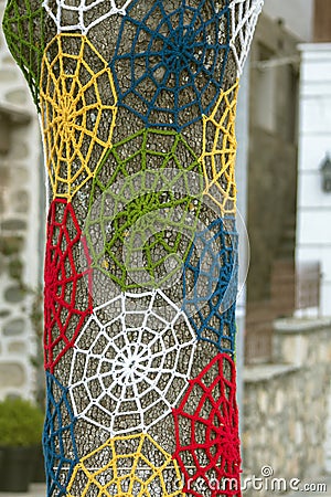 Tree in the park, dressed in multicolored lace. Stock Photo